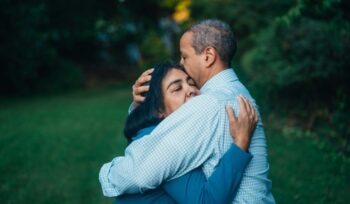 Man and woman embracing
