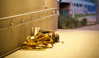 Homeless person laying down