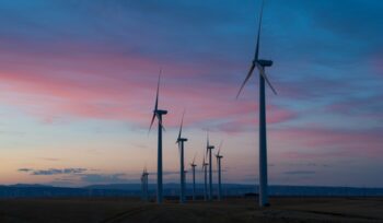 Wind turbines at sunset