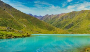 Kyrgyzstan landscape with teal lake