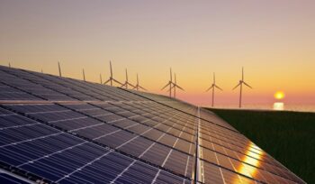 Solar in the foreground, wind turbines in the background